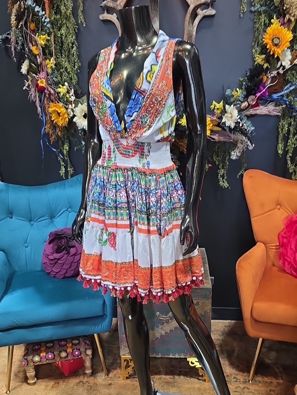 Bohemian Multi Pattern Story Dress with Tassel & Pom Pom Trim.